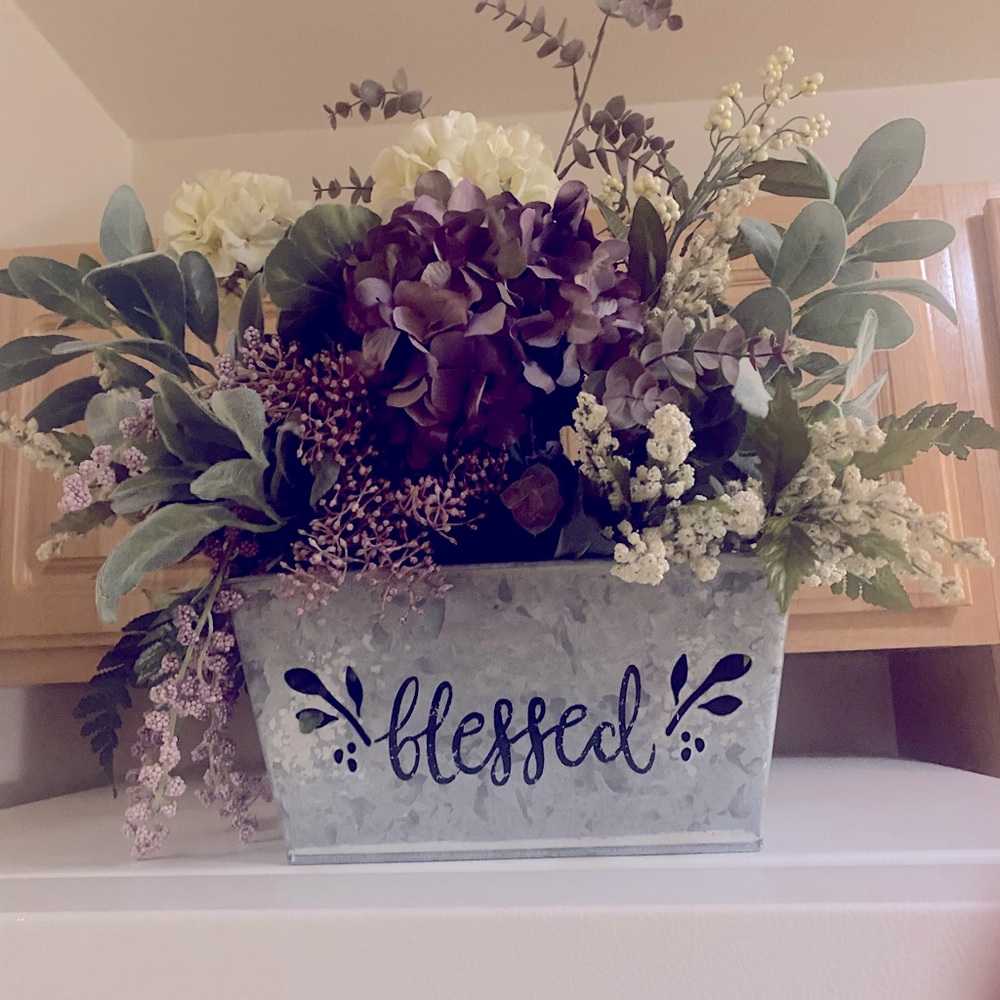 Gorgeous handmade centerpiece. Says blessed. Nice to decor for home